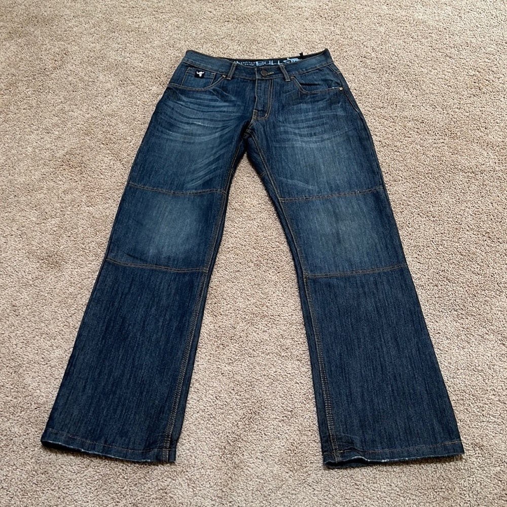 Speed and strength mens run with the bulls jeans , SZ 32/32.